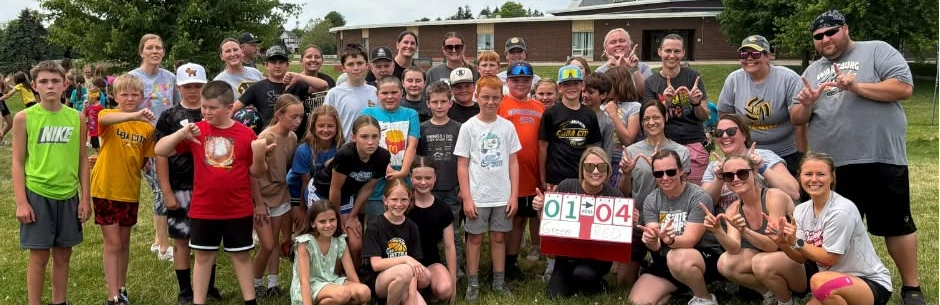 Students and staff kickball game