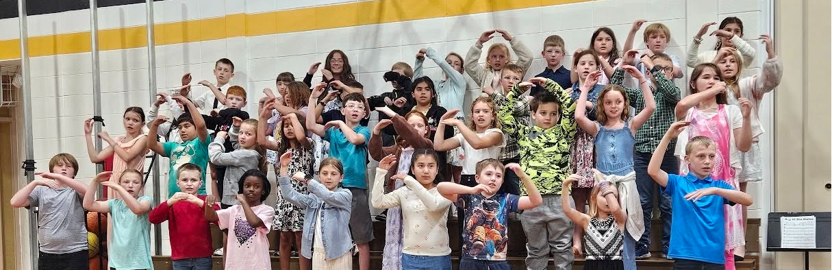Students singing at concert