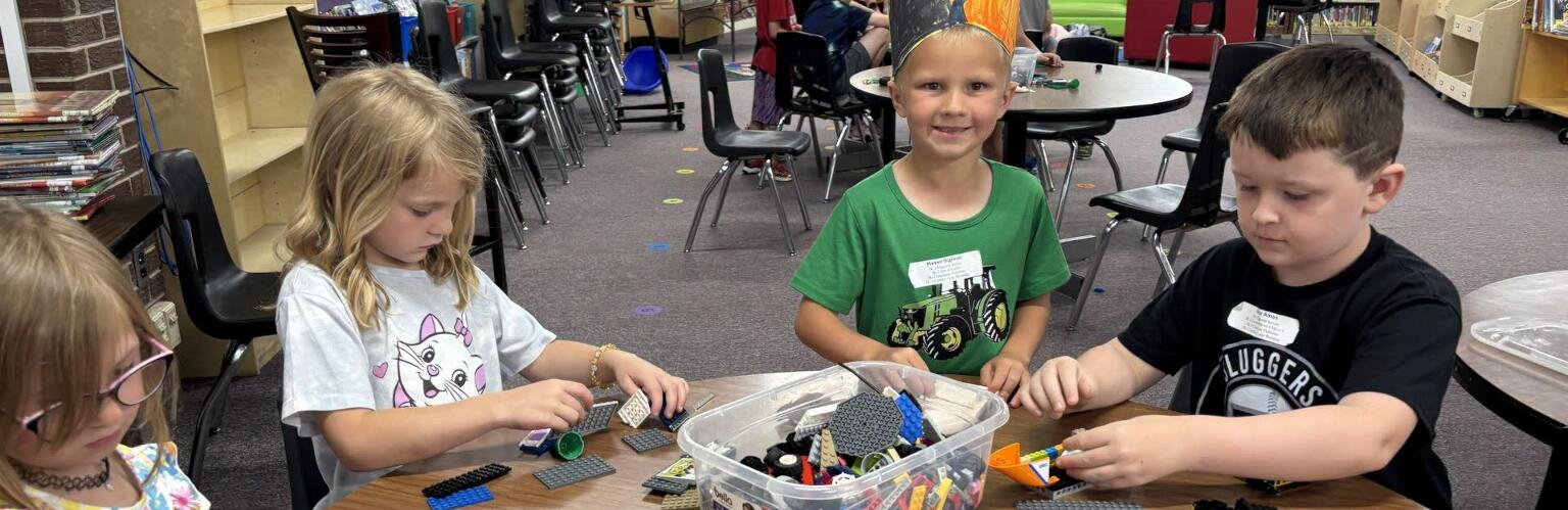 Students playing with Legos