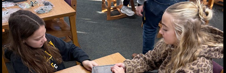 Students building robots